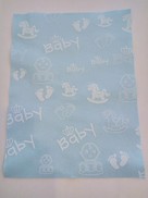 Feltro azzurro stampa baby bianco