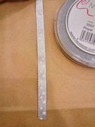 Nastro argento con stelle bianche