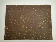 Feltro marrone con stampa brillantini "stelle" colore oro
