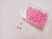 Perline in plastica colore rosa