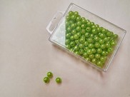 Perline in plastica colore verde