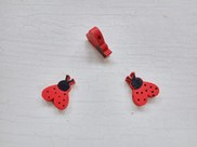 Coccinella in legno colore rosso