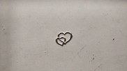 Mini cuore doppio in plastica colore argento