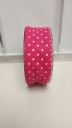 Nastro fucsia in tnt a pois bianchi