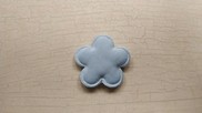 Fiore "spring"  in tessuto azzurro