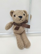 Orsetto in tessuto effetto peluche colore marrone