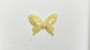 Farfalla in tessuto paillette colore giallo