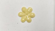 Fiore in tessuto paillette colore giallo